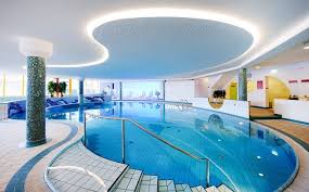 Indoor Swimming Pool With Extraordinary Design Ideas Indoor Outdoor Pool Indoor Pool Amazing Swimming Pools