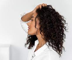 5 Tips For Taming Curly Frizzy Hair Without Making It Greasy