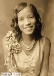 The huge knot bang is a statement of black elegance and ingenuity. 1920s Hairstyles History Long Hair To Bobbed Hair