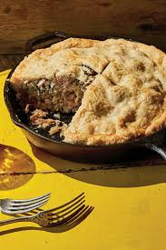 Tourtiere A French Canadian Meat Pie That Combines Pork And Warm Spices With Chunks Of Braised Pork Shoulder And Shreds Of Chicken Or Tu Recipes Meat Pie Food