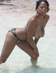 Nude ebony on beach