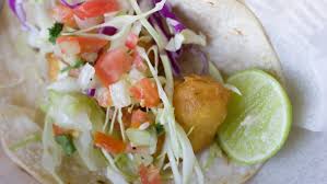 Two beer battered fish tacos topped with spicy sauce, cabbage and pico de gallo served with refried beans and rice. Top 9 Tasty Cheap Taco Shops In Metro Phoenix