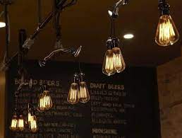 Edison Light Bulb Love At Lillie Q S In Chicago Pulley Light Fixture Pendant Light Fixtures Restaurant Design Rustic