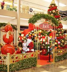 Last but not least, remember the wrapping paper. Santa Greets A Visitor At The Christmas Display At Willowbrookmall In Nj For More Info Commercial Holiday Decor Christmas Stage Design Christmas Decor Diy