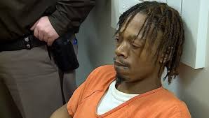 Injured Battle Creek officer testifies at shooting suspect's hearing