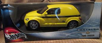 Look for electric panel, switchboard, panel switch? Amazon Com Hot Wheels 1 18 Scale Diecast 54578 Chrysler Pt R T Panel Crusier Yellow Toys Games