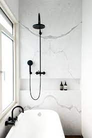 Black cabinets are a hard yes for us. Marble Trends Matte Black Fixtures White Marble The Davani Group