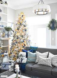 Plaid decorated christmas tree from intelligent domestications. Flocked Christmas Tree Decor Blue Silver Gold Citrineliving
