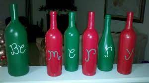 Wine Bottles Painted With Acrylic Paint And Sprayed With Glass Wine Bottle Crafts Wine Bottle Diy Christmas Painted Wine Bottles