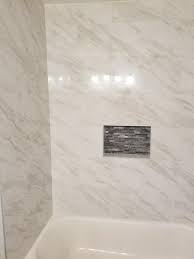 Update your garage with garage floor tiles that are durable and can handle extra moisture. Home Decorators Collection Kolasus White 12 In X 24 In Polished Porcelain Floor And Wall Tile 16 Sq Ft Case Nhdkolwhi1224p The Home Depot Porcelain Flooring White Bathroom Tiles Bathroom Wall Tile
