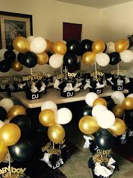 Complete the party with a tiered cake with gold decorations and yellow punch and champagne to drink. Black And Gold Babyshower Centerpieces Birthday Decorations For Men 50th Birthday Decorations 60th Birthday Party