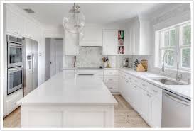 Torquay Quartz By Cambria Is Made Up Of A White Base With Black And Grey Veins Quartz White Kitchen Renovation White Marble Kitchen White Kitchen Countertops