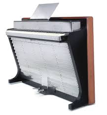 The ph bow piano eschews the 'traditional' piano design that simply boxes the soundboard, action and strings of the piano inside. Poul Henningsen Danish 1894 1967
