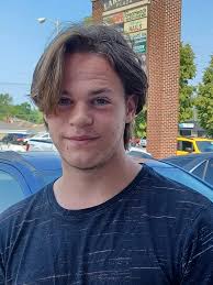 Where can I find a barber in West St. Paul to cut my son's hair into a faux  hawk?