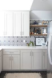 15 White Kitchen Cabinet Ideas To Brighten Up Your Kitchen Space Patterned Tile Backsplash Kitchen Renovation Kitchen Tiles Backsplash