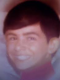 Here are my brothers and sisters along with our neighbor, Johnny Patterson,  who has passed away. I am the baby in Johnny's lap. Johnny was also the  father of Wes Patterson, who