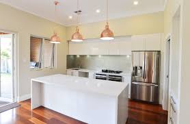 Stunning New Kitchen In Classic White With Stainless Steel Appliances Glass Splashback Feature Lighting Over The Brea Home Renovation Home Glass Splashback