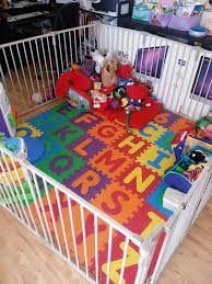 The Play Area Containing The Kiddie Tornado Toddler Play Area Kids Play Area Baby Playroom