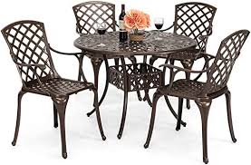 This steel patio dining set is straightforward to assemble and even features an umbrella hole to help keep your surface shaded. Amazon Com Best Choice Products 5 Piece All Weather Cast Aluminum Patio Dining Set W 4 Chairs Cast Iron Patio Furniture Iron Patio Furniture Patio Dining Set