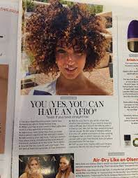 Take a rod in one hand and wrap the end of a section of hair around one end of the rod. Allure Catches Hell For Teaching White Women How To Get An Afro Huffpost Life