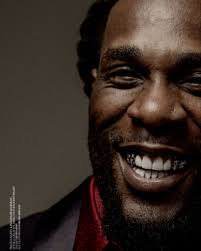 Burna Boy wears a Giorgio Armani look featured