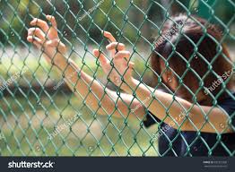 Prison Teen Girl Cage Hand Fence Stock Photo 520319308 | Shutterstock