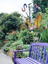 The garden bench can be easily bolted to the floor. The Many Moods Of Garden Benches Better Homes Gardens
