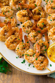 This shrimp marinade packs a huge punch of flavor and is made with ingredients that you can probably already find in your house! Grilled Shrimp Seasoning Best Easy Grilled Shrimp Recipe