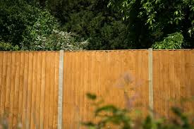Above ground concrete fence post base. Fencing Fencing Repair Forest Garden