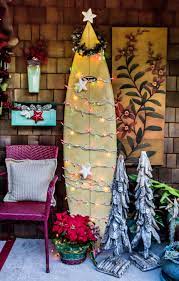 Check spelling or type a new query. Beach Christmas On The Front Porch With Surfboard Christmas Tree With Lights In Haw Beach Style Christmas Decorations Florida Christmas Coastal Christmas Decor