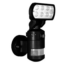Lithonia lighting oms 2000 pr2 120 wh m4 white 2 head flood light with 1 direction motion sensor, higher wattage. Nightwatcher Security 220 Degree Outdoor Black Motorized Motion Tracking Led Security Light With Built In Security Camera Nw700bk The Home Depot