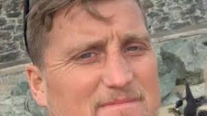 Hero motorist 'talked down' man threatening to jump from motorway gantry