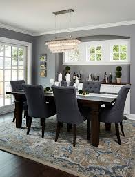 Elegant dining room photo in grand rapids with beige walls and medium tone hardwood floors. Cape Cod Cottage Remodel Home Bunch An Interior Design Luxury Homes Blog Dark Wood Dining Room Wood Dining Room Table Dark Wood Dining Table