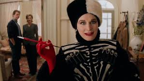 Cruella, whose true identity is a big juicy secret until the ruse peters out in one of many dramatic opportunities blown by director craig gillespie (i, tonya), doesn't even kill dogs this time. Look Of The Week Cruella De Vil S Wild Wardrobe