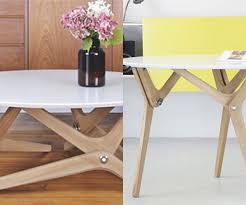 A coffee table that becomes a dining table or a desk — in seconds! Watch This Coffee Table Transform Into A Dining Table In A Second Ideal Home