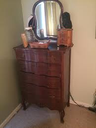 Look out for collection names like arctic, sail or retro. Highboy Dresser With Mirror And Locking Drawers Antique Appraisal Instappraisal