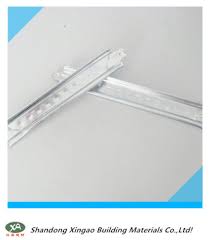 Then lift the grid ceiling tile slightly and insert the hanger over the lower leg of the t bar ceiling where it meets of the main beams. China Skeleton T Grid Bar For All Kinds Of Ceilings China Ceiling Grid T Bar