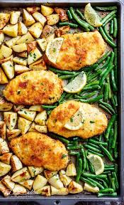 Oven Baked Crispy Sheet Pan Lemon Parmesan Garlic Chicken Veggies Complete With Potatoes And Green Recipes Dinner Recipes Easy Family Family Dinner Recipes