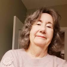 I think my grandma's rose bush is blooming better than it has in years! I'm  so glad I brought a transplant of it with me to our home! I know she is