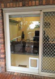 Many households have at least one domestic pet, mainly a cat or dog. Screen Door With Pet Door Aussie Pet Doors