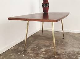 Imagine a brass coffee table in the middle of living room. Vintage Mid Century Walnut Coffee Table With Brass Legs 1950s Vintagonist
