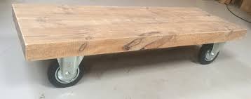 pin op rene houtman salontafel landelijk stoer eikenhout wielen robuust staal vlaamse stijl