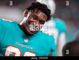 Miami Dolphins defensive tackle Akeem Spence (93) does drills at the team's  NFL football training facility, Tuesday, June 4, 2019, in Davie, Fla. (AP  Photo/Lynne Sladky Stock Photo