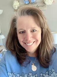 I'm looking for a recommendation for a hair salon for a middle aged woman  with naturally greying hair (I like the grey!). I'm specifically looking  for a salon where the hairdresser is