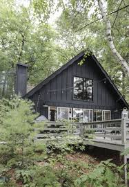 Black Exterior Paint On The Cabin Mountain Home Exterior Cabin Exterior Colors Black House Exterior