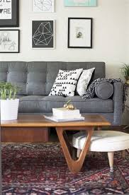 A light grey sofa would go well with a dark grey carpet, adding contrast and a minimalist style, while a charcoal grey sofa goes nicely with light grey flooring (again for the same reasons). 10 Reasons To Choose A Grey Couch 50 Decoration Ideas Stylishwomenoutfits Com Rugs In Living Room Dark Grey Couch Living Room Grey Couch Living Room