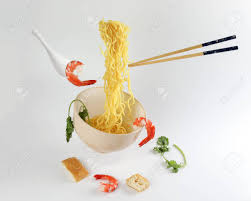 Spice up the ramen noodles with chili oil for an extra kick. Yellow Seafood Prawn Coriander Leaf Noodle Soup Elevated Flying Suspended In Air With Soup Spoon And Chopstick Prawn Coriander Leaf Tofu On White Background Stock Photo Picture And Royalty Free Image Image