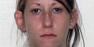 Cops: Bikini-clad carjacker held in robbery bid