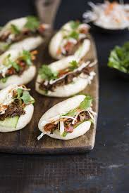 Place onion, garlic, flank steak, green onions, soy sauce, water, brown sugar, ginger, and hoisin sauce in a slow cooker. Gua Bao With Hoisin And Ginger Beer Pulled Pork Recipe In The Slow Pressure Cooker Drizzle And Dip