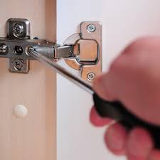how to adjust cabinet doors